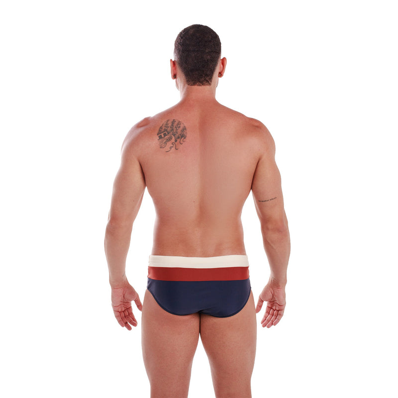 Caio Classic Arpoador men's Brazilian swim brief in paneled tricolor off-white, siena and eclipse — back view