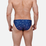 Model wearing Bikini Caio Brazilian swim brief in Celestial Azure (blue)