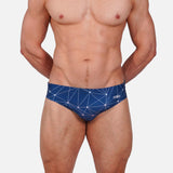 Model wearing Slim Caio Brazilian swim brief in Celestial Azure (blue)
