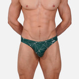 Model wearing Bikini Caio Brazilian swim brief in Starwood