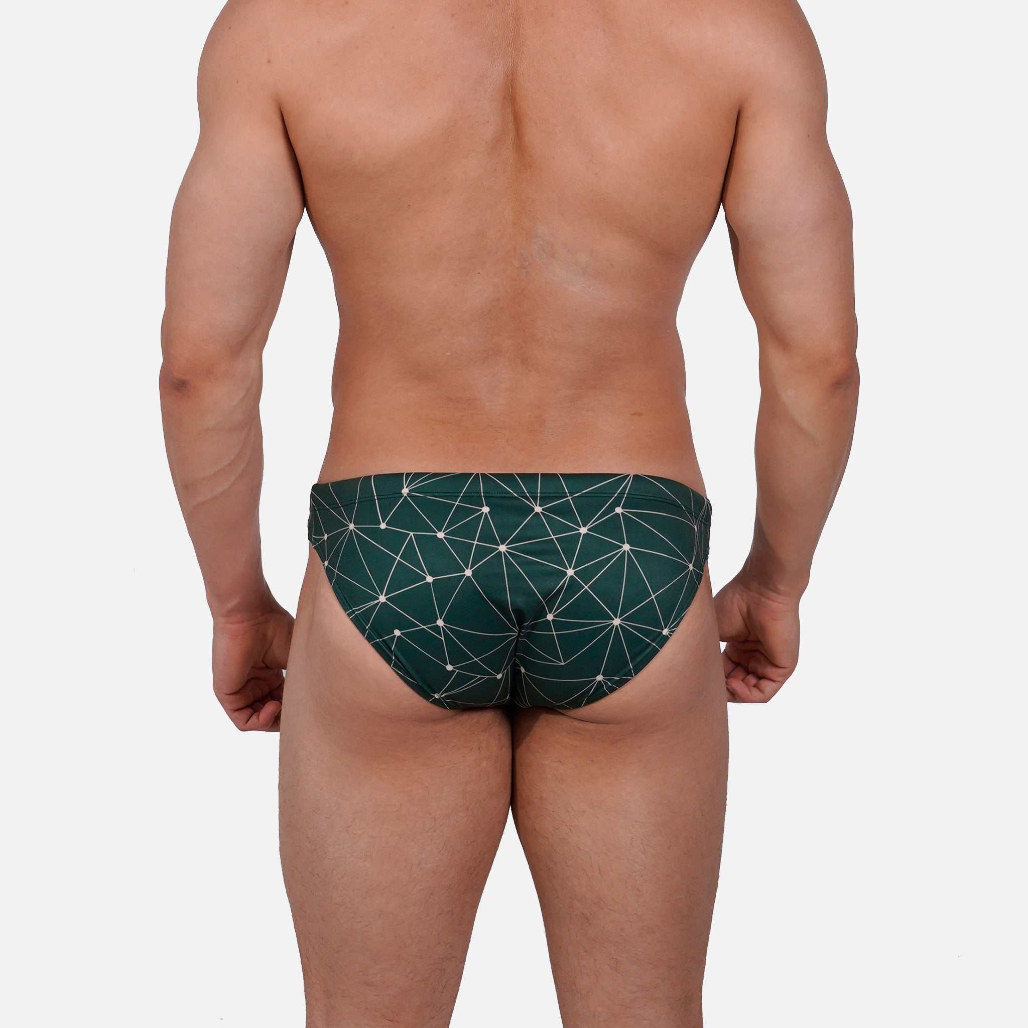 Model wearing Bikini Caio Brazilian swim brief in Starwood