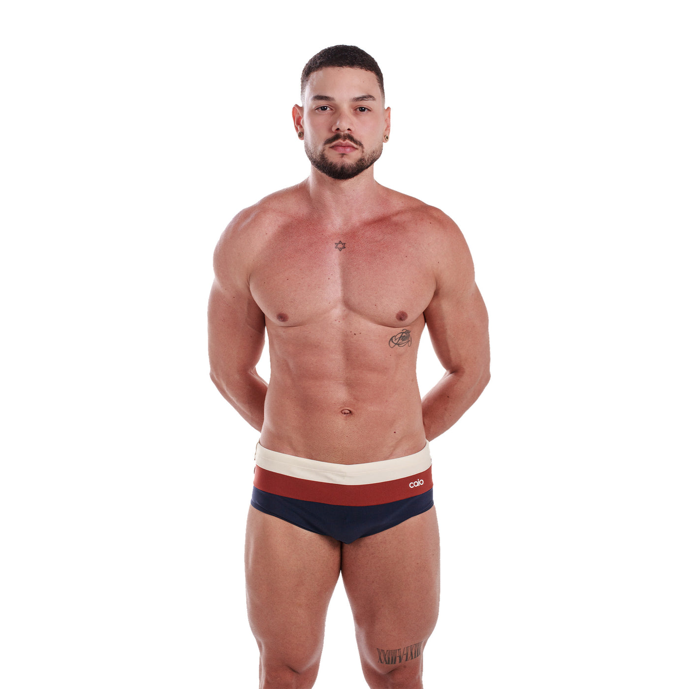 Arpoador front — off white, siena and eclipse paneled swim brief