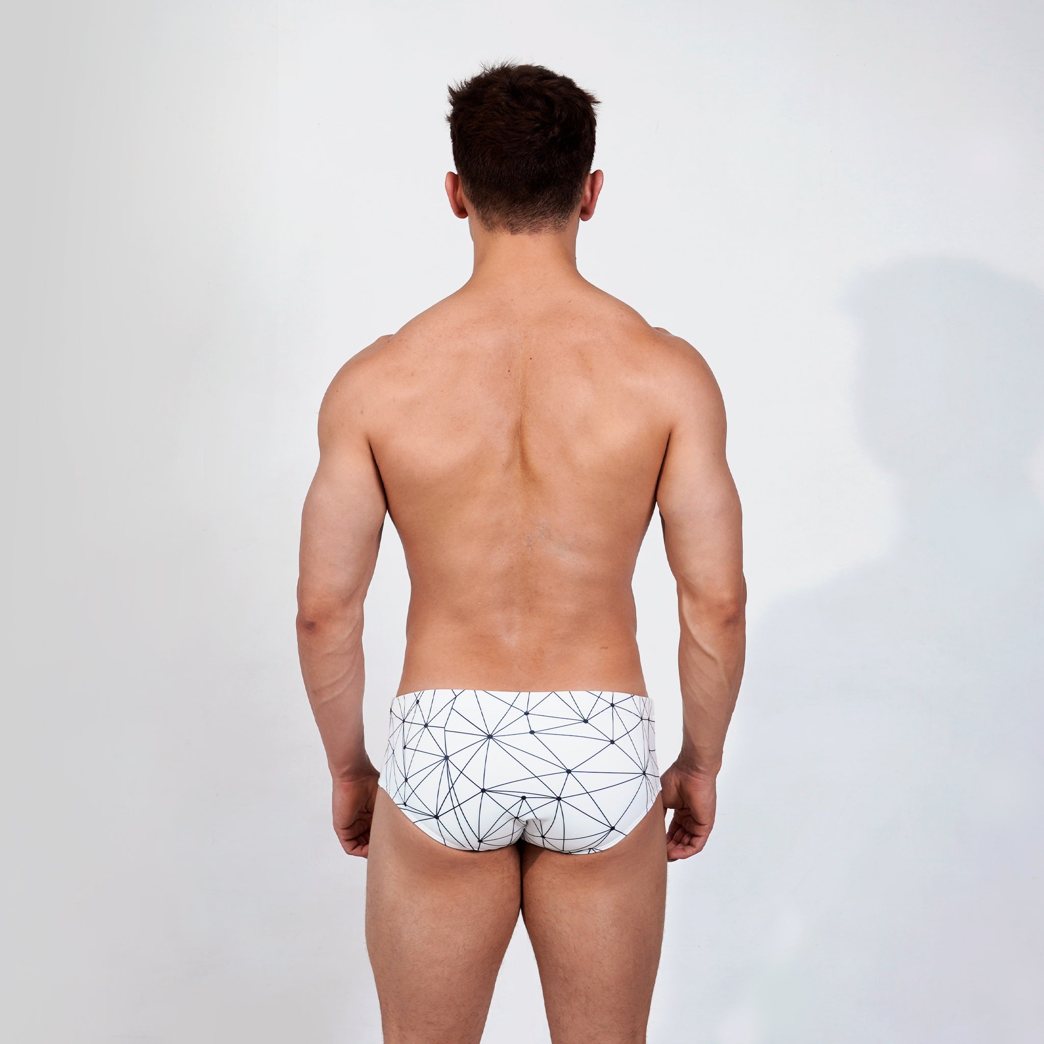model posing for a studio photo wearing Caio Classic Nova Frost Swim Brief
