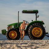 Model wearing Slim Caio Brazilian swim brief in Astro Moss (olive green)