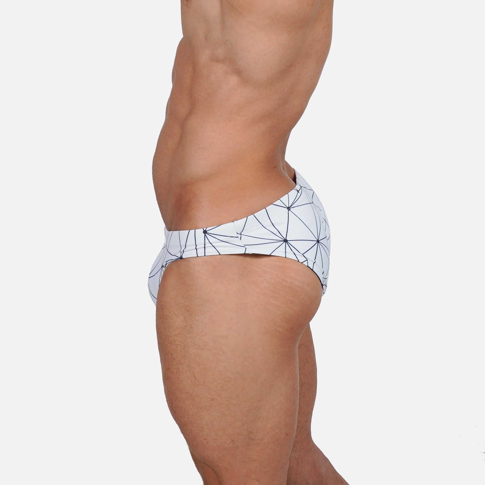 Model wearing Bikini Caio Brazilian swim brief in Nova Frost (white)